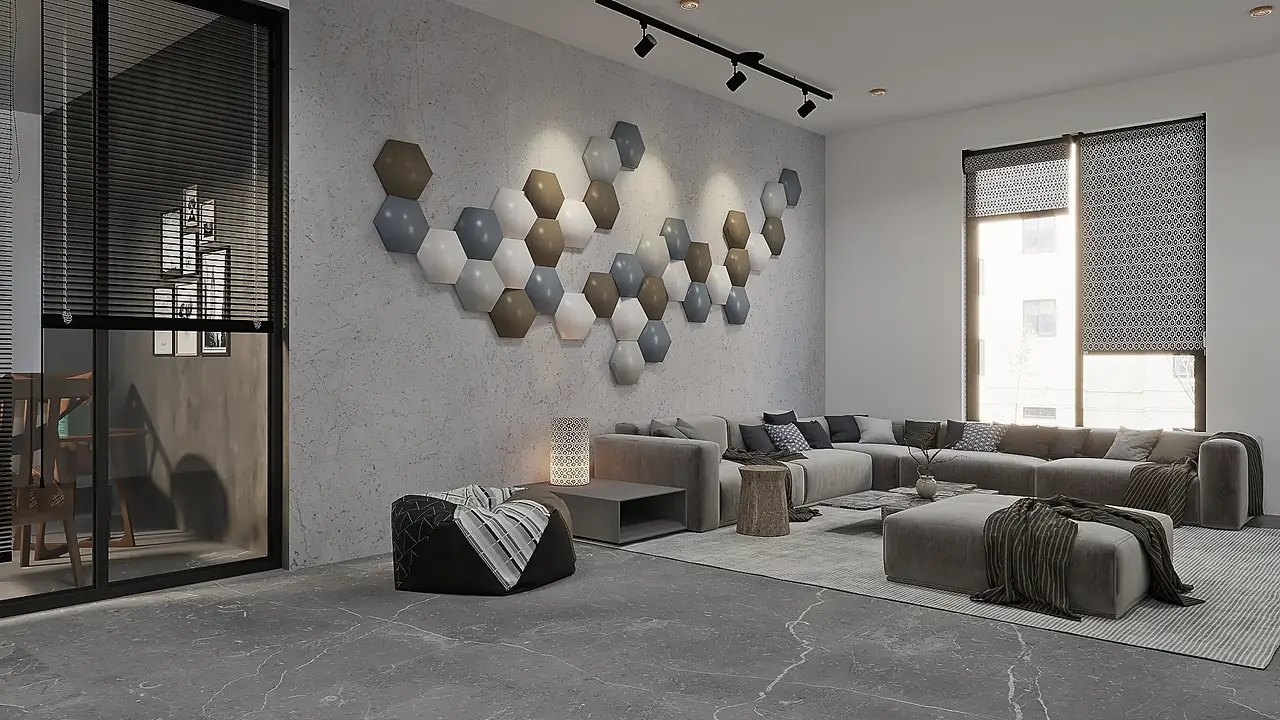 A calm stone-toned living room with a low sectional sofa and sculptural wall relief.
