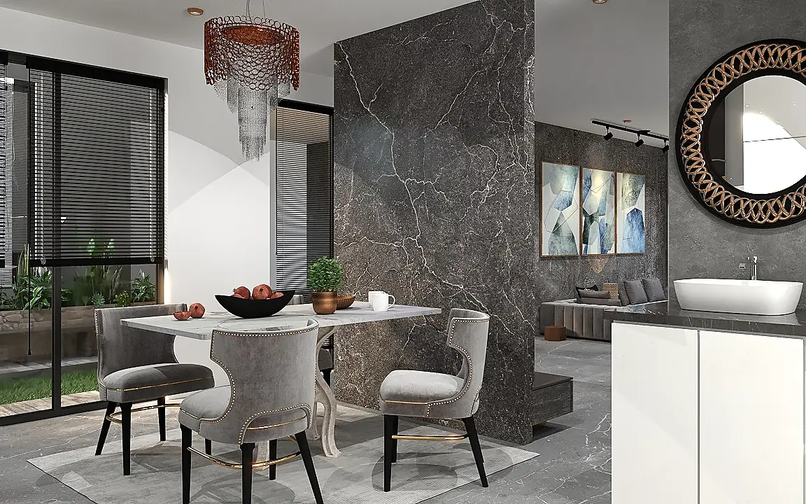 A dining table set against a full-height marble column.