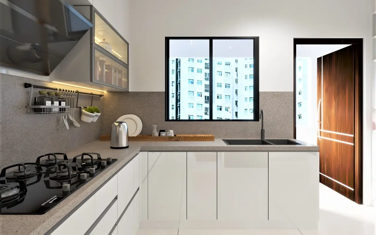 A graphite and white galley run with recessed handles.
