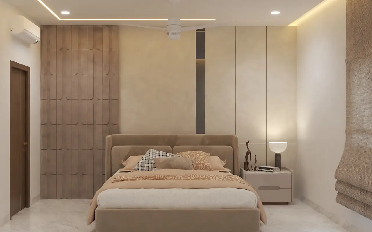 A quiet bedroom in sand tones with an upholstered wall.