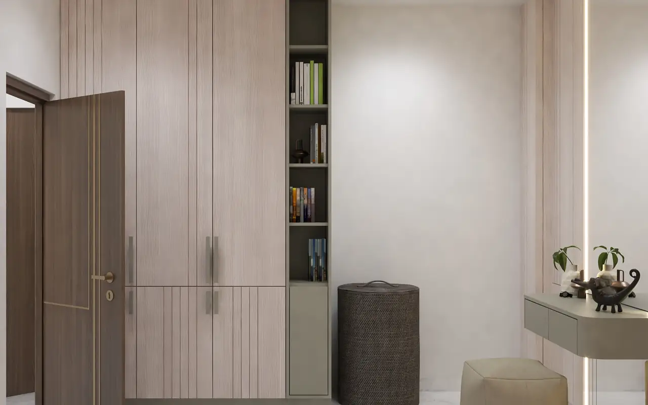 A dressing room in warm neutrals with fluted glass doors.